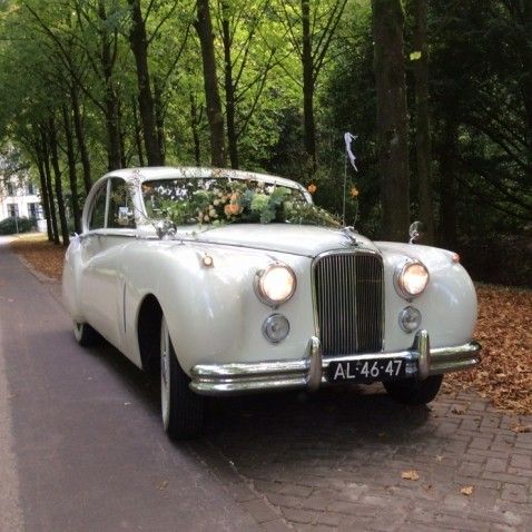 Oldtimer-verhuur Jag Tax Trouwauto's