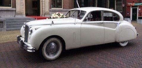 Oldtimer-verhuur Jag Tax Trouwauto's