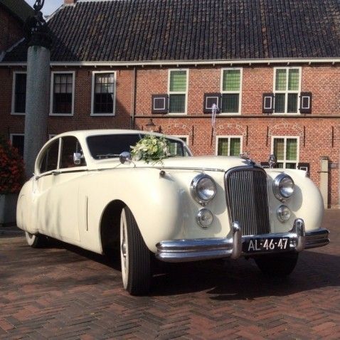 Oldtimer-verhuur Jag Tax Trouwauto's