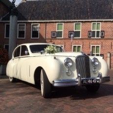 Oldtimer-verhuur Jag Tax Trouwauto's