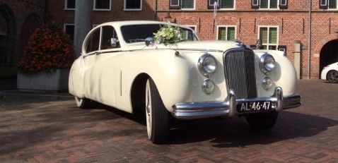 Oldtimer-verhuur Jag Tax Trouwauto's