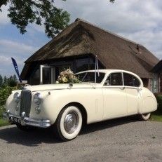 Oldtimer-verhuur Jag Tax Trouwauto's