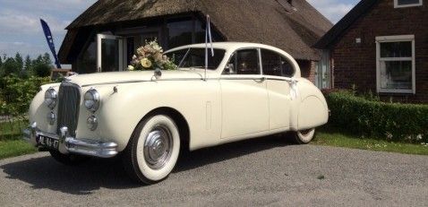 Oldtimer-verhuur Jag Tax Trouwauto's