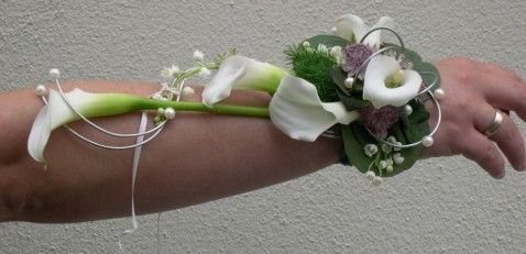 Corsages Bloembinderij John Flora Corsages Bloembinderij John Flora